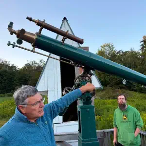 Arunah Hill member Ed Faits explains the Gaertner telescope