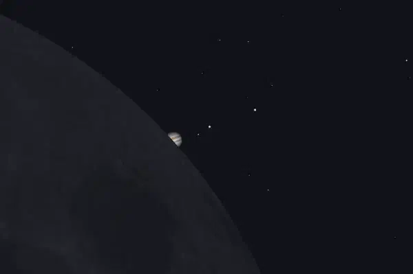 Egress just beginning, a sliver of Jupiter reappearing from the dark limb, 5:28 AM EDT